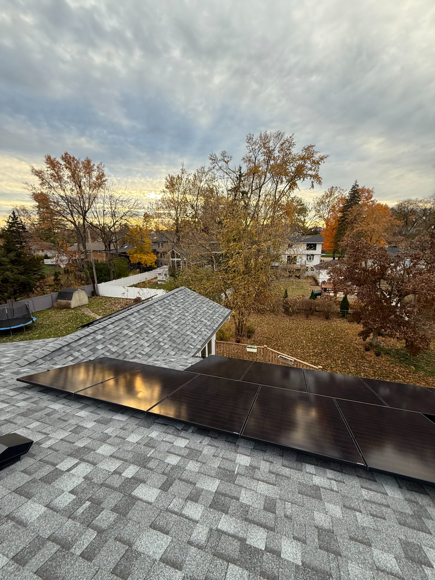 Rooftop solar installation Illinois sunset